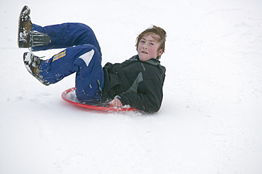 Child playing in the snow in Aviemore, Scotland, United Kingdom, Europe