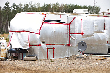 Insulated RV's and trailers where workers from the tar sands industry live north of Fort McMurray, Alberta, Canada, North America