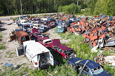 A scrap metal dump in Fort Chipewyan, Alberta, Canada, North America