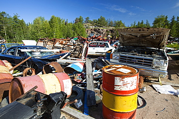 A scrap metal dump in Fort Chipewyan, Alberta, Canada, North America