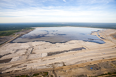 The tailings pond at a mine north of Fort McMurray, Alberta, Canada, North America