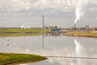 The tailings pond at the Syncrude mine north of Fort McMurray, Alberta, Canada, North America