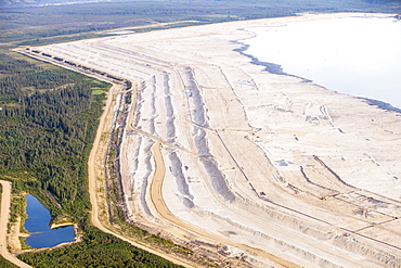 The tailings pond at the Syncrude mine north of Fort McMurray, Alberta, Canada, North America