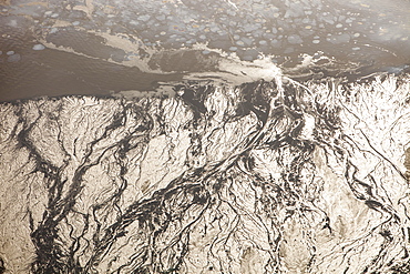 The tailings pond at the Syncrude mine north of Fort McMurray, Alberta, Canada, North America