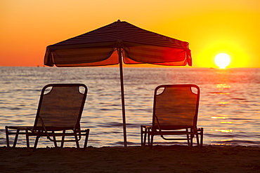 Sunset over a beach in Myrina, on Lemnos, Greek Islands, Greece, Europe