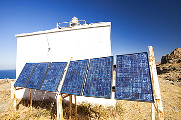 Solar panels used to power a lighthouse above Myrina on Lemnos, Greek Islands, Greece, Europe