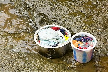 Washing clothes in a highland stream on Fiji, Pacific