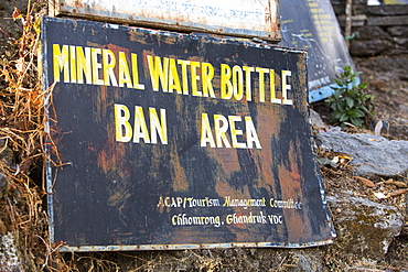 A sign about the ban on taking plastic water bottles into the Annapurna Sanctuary, Himalayas, Nepal, Asia