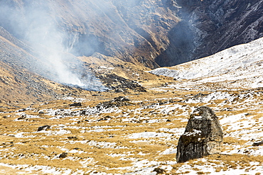 Annapurna Sanctuary with vegetation burned in the foreground, Himalayas, Nepal, Asia