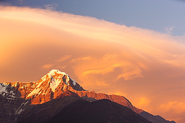 Alpenglow at sunset on Annapurna South, Nepalese Himalayas, Nepal, Asia