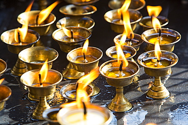 Hindu prayer candles in a shrine in Kathmandu, Nepal, Asia