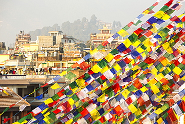 Prayer flags at the Boudhanath Stupa, one of the holiest Buddhist sites in Kathmandu, Nepal, Asia