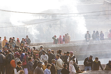 A cremation ceremony at the Pashupatinath Temple, a Hindu temple of Lord Shiva on the banks of the Bagmati River, UNESCO World Heritage Site, Kathmandu, Nepal, Asia