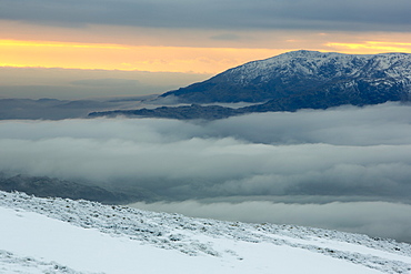 Red Screes above Ambleside with mist from a temperature inversion, looking towards Coniston Old Man, Lake District National Park, Cumbria, England, United Kingdom, Europe