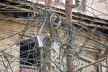 A tangle of electricity wires in Kathmandu, Nepal, Asia