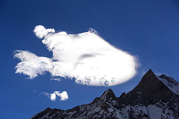 Jet stream winds over Machapuchare in the Annapurna Himalayas in Nepal, Asia