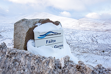 Snow drifts covering a welcome sign at the Cairngorm Ski Centre near Aviemore, Scotland, United Kingdom, Europe