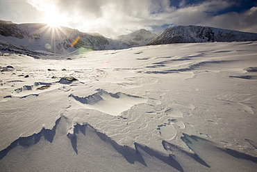 Sastrugi on windslab drifted snow in Coire an Sneachda in the Cairngorm mountains, Scotland, United Kingdom, Europe