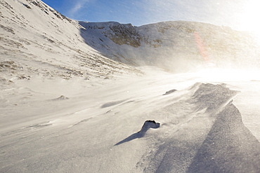 Drifting snow in Coire an Sneachda in the Cairngorm mountains, Scotland, United Kingdom, Europe