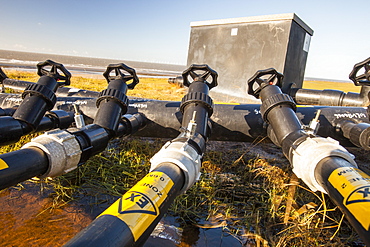 Methane being extracted from an old landfill site on Walney Island, to power a biogas generator producing green electricity, Cumbria, England, United Kingdom, Europe