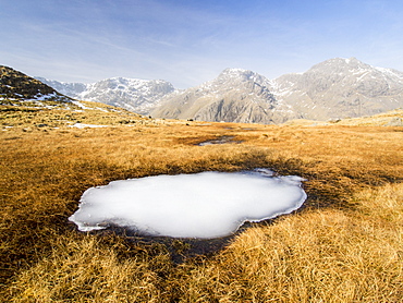 Scafell and Scafell Pike from the Upper Esk with a frozen tarn in the foreground, Lake District, Cumbria, England, United Kingdom, Europe