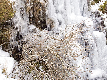 A frozen waterfall in Grains Ghyll in Borrowdale, Lake District National Park, Cumbria, England, United Kingdom, Europe