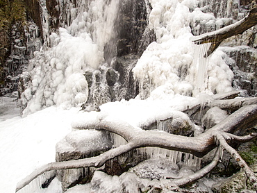 Ice formations on Taylor Gill Force waterfall, above Seathwaite in Borrowdale, Lake District National Park, Cumbria, England, United Kingdom, Europe