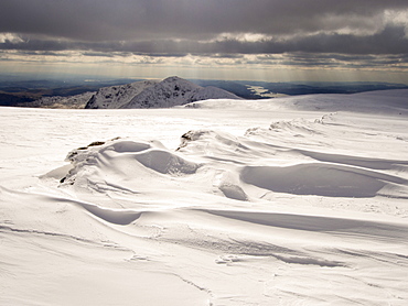 The Kentmere Fells and Lake Windermere from High Street in unseasonally cold weather in late March 2013, with wind sculpted snow, Lake District National Park, Cumbria, England, United Kingdom, Europe