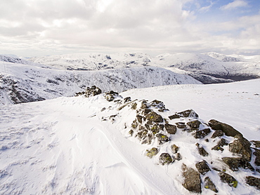 Looking towards Helvellyn fom Gray Crag during unseasonally cold weather in late March 2013, Lake District National Park, Cumbria, England, United Kingdom, Europe