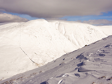 Wind sculpted snow on Gray Crag during unseasonally cold weather in late March 2013, Lake District, Cumbria, England, United Kingdom, Europe