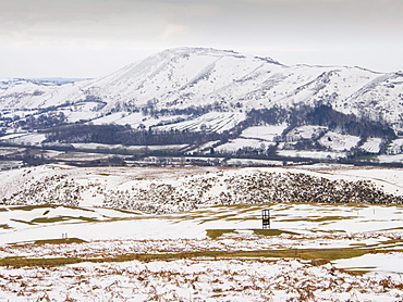 Church Stretton golf course covered in snow in late March, looking towards Caer Caradoc, Shropshire, England, United Kingdom, Europe