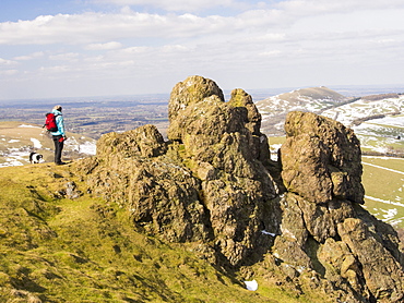 A woman walker on Hope Bowdler Hill above Church Stretton in Shropshire, England, United Kingdom, Europe