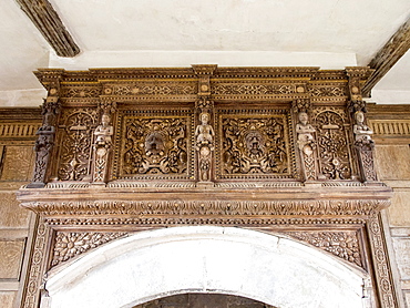 Intricate wood carving above the fire place in Stokesay Castle, a fortified manor house built in the late 13th century, in Stokesay, near Craven Arms, Shropshire, England, United Kingdom, Europe