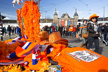 A stall selling orange clothing to celebrate Queens Day in Amsterdam, Netherlands, Europe