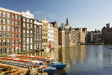 Tour boats in front of old houses, Amsterdam, Netherlands, Europe