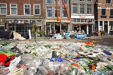 Litter on the streets of Amsterdam following the annual Queens Day celebrations, Netherlands, Europe