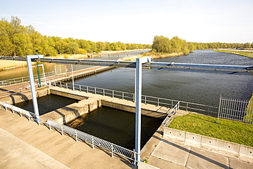 A canal going from the sea to the reclaimed polder land which is some 20 feet lower than the sea, north of Amsterdam, Netherlands, Europe