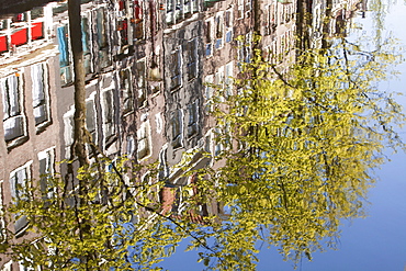 Reflections of prostitutes windows and brothels in the red light district, Amsterdam, Netherlands. Europe