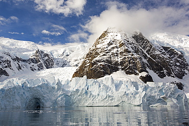 Stunning coastal scenery beneath Mount Walker in Paradise Bay off Graham Land on the Antarctic Peninsular. the Peninsular is one of the most rapidly warming places on the planet.