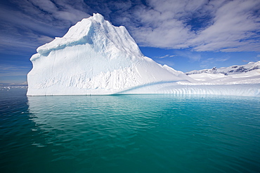 An iceberg in the Gerlache Strait separating the Palmer Archipelago from the Antarctic Peninsular off Anvers Island. The Antartic Peninsular is one of the fastest warming areas of the planet.