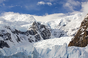 Stunning coastal scenery beneath Mount Walker in Paradise Bay off Graham Land on the Antarctic Peninsular. the Peninsular is one of the most rapidly warming places on the planet.