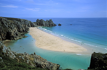 Porthcurno beach near the Minnack Theatre in West Cornwall. Lagoon at low tide.