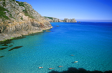 Swimming in sea. Porthcurno beach near the Minnack Theatre in West Cornwall      (rr)