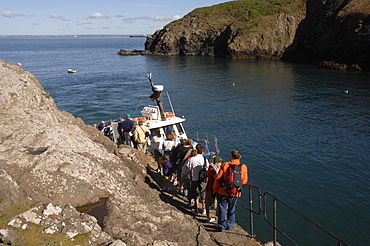 Tourists boarding the Dale Princess at Martins Haven, Martins Haven, Pembrokeshire, Wales, UK, Europe