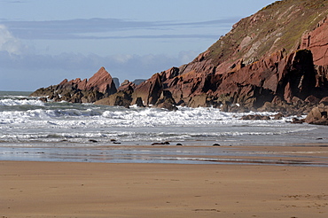 Waves and cliff, West Dale beach, Dale, Pembrokeshire, Wales, UK, Europe