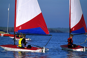 Children learning to sail Toppers, Dale, Pembrokeshire, Wales, UK, Europe