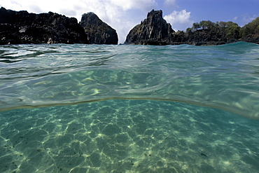 Sandy bottom and Dois Irmuos island from Porco's Bay, Fernando de Noronha, UNESCO World Heritage Site, Brazil, South America