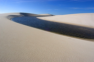 Sand dunes and lake of Lencois Maranhenses National Park, Santo Amaro, Maranhao, Brazil, South America