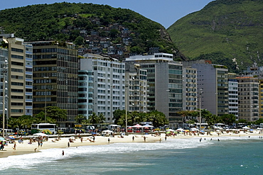 Copacabana Beach with Pavaozinho slum in the background, Rio de Janeiro, Brazil, South America