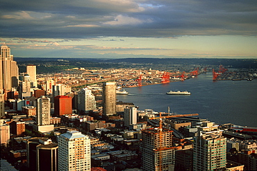 Downtown buildings overlooking Puget Sound at dusk, Seattle, Washington, United States of America, North America